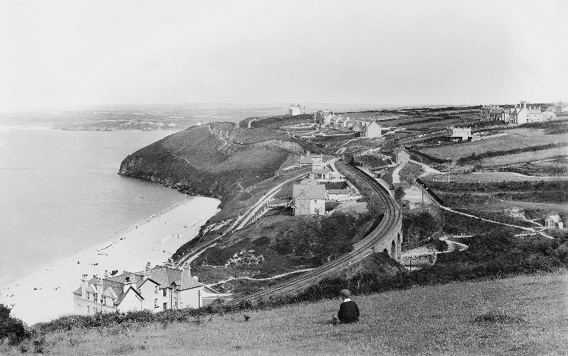 A view of Carbis Bay (Carrack Gladden) before very much development is in evidence. The first hotels have appeared though and beach hunt/tents can be seen on the beach itself, St. Ives, Cornwall