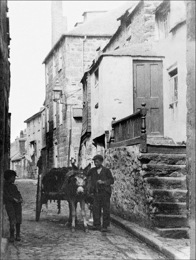 A view of the Digey with donkey cart. Hicks Court, with its famous granite arch is just off to the left, St. Ives, Cornwall