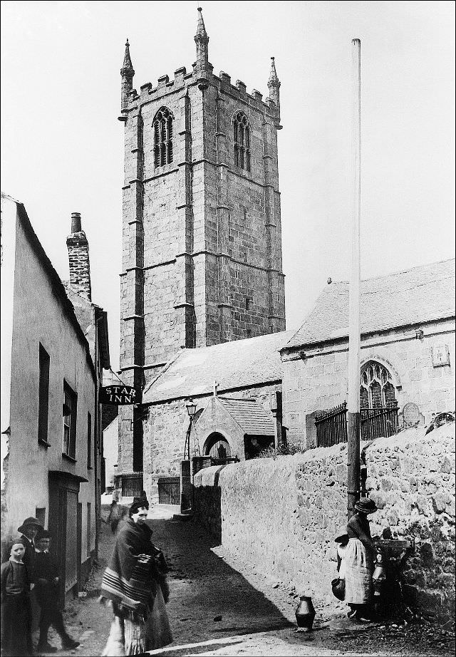 A view of the Parish Church of St. Ia and its sturdy granite tower. To the left is the Star Inn (long since demolished), St. Ives, Cornwall