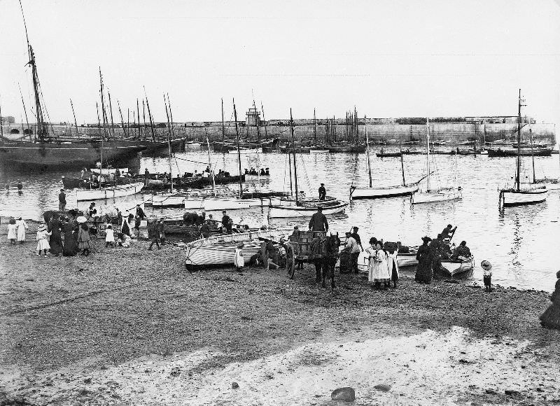 Much activity in the harbour with the arrival and unloading of a seine boat, St. Ives, Cornwall