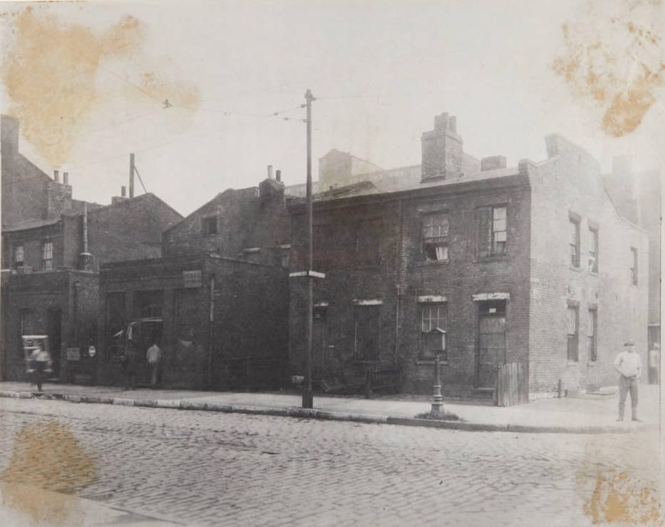 Row of buildings on Morgan Street near its intersection with 13th in 1920. Miller's F C Laundry Company was located at 1232 Morgan.