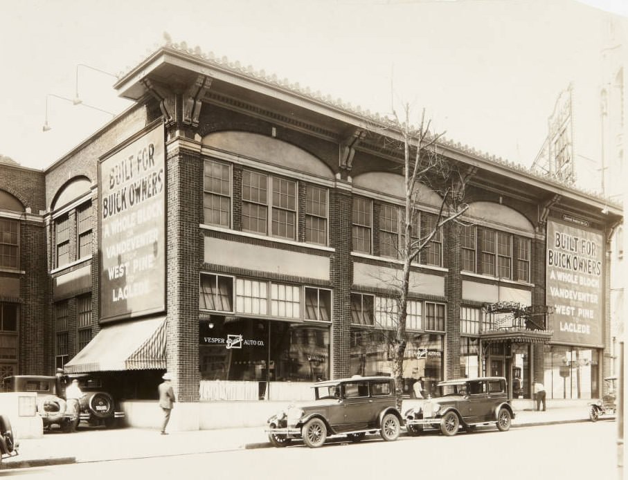 Vesper Buick Auto Co. car dealership building in 1920. Large signs advertise for their showroom on Vandeventer.