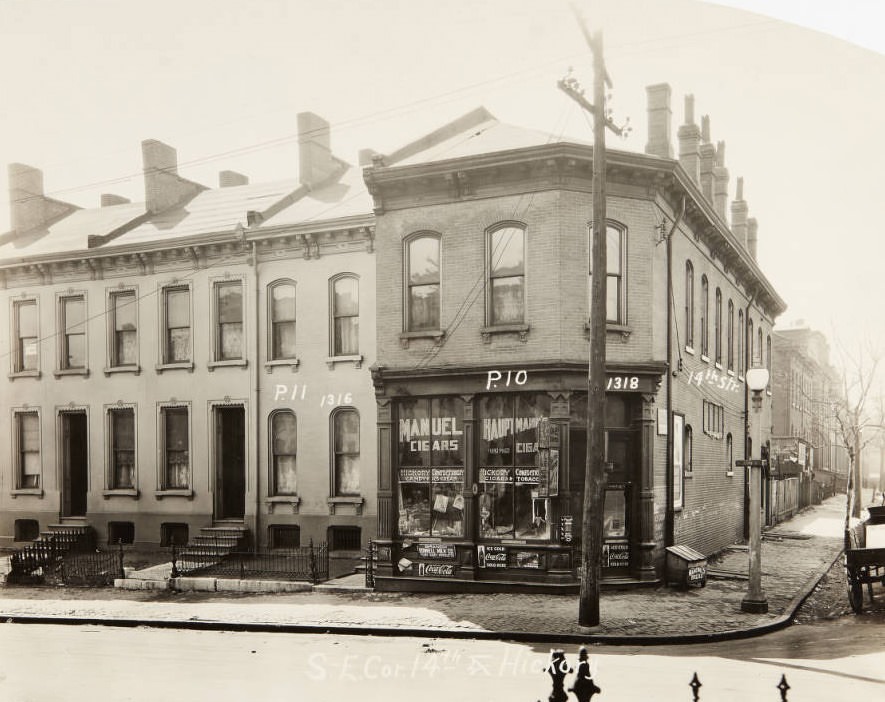 Buildings on the southeast corner of 14th and Hickory streets in 1920, featuring the Hickory Confectionary at 1318 Hickory.