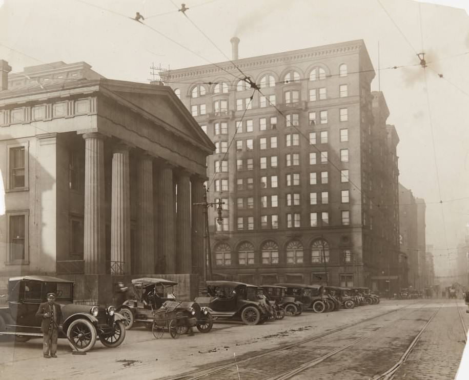 A row of cars parked in front of the Old Courthouse on Fourth Street in 1920.
