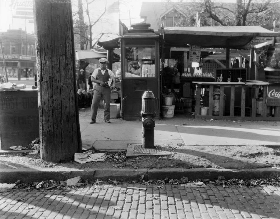 Young man selling newspapers at Hodiamont & Easton in 1925