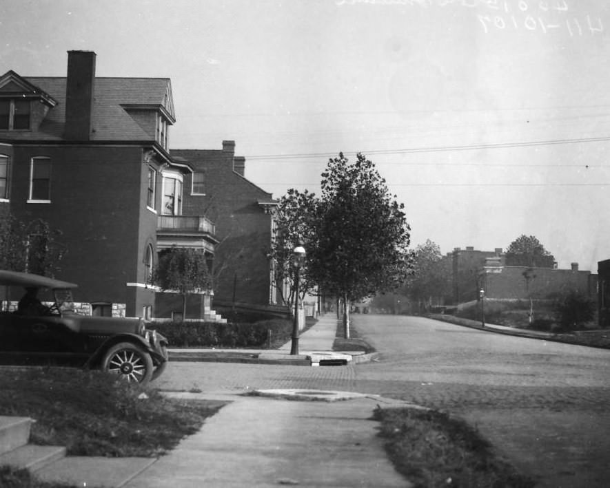 East view of residences on Cote Brilliante Ave. at the intersection with Warne Ave, Bishop P.L. Scott Ave, with the house across the street at 3965 Cote Brilliante Ave visible, 1925