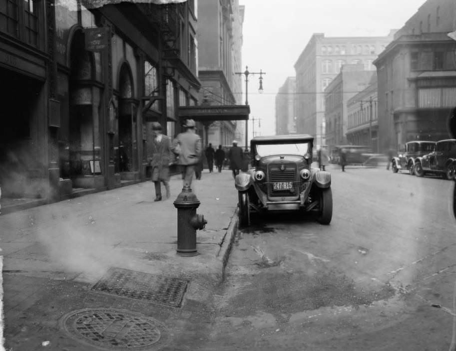 View looking north down North 10th Street towards Locust Street. Bolland’s Jewelry Store was located at 325 North 10th Street, and the Kinloch Building was behind it at the NW corner of North 10th Street & Locust Street, 1927