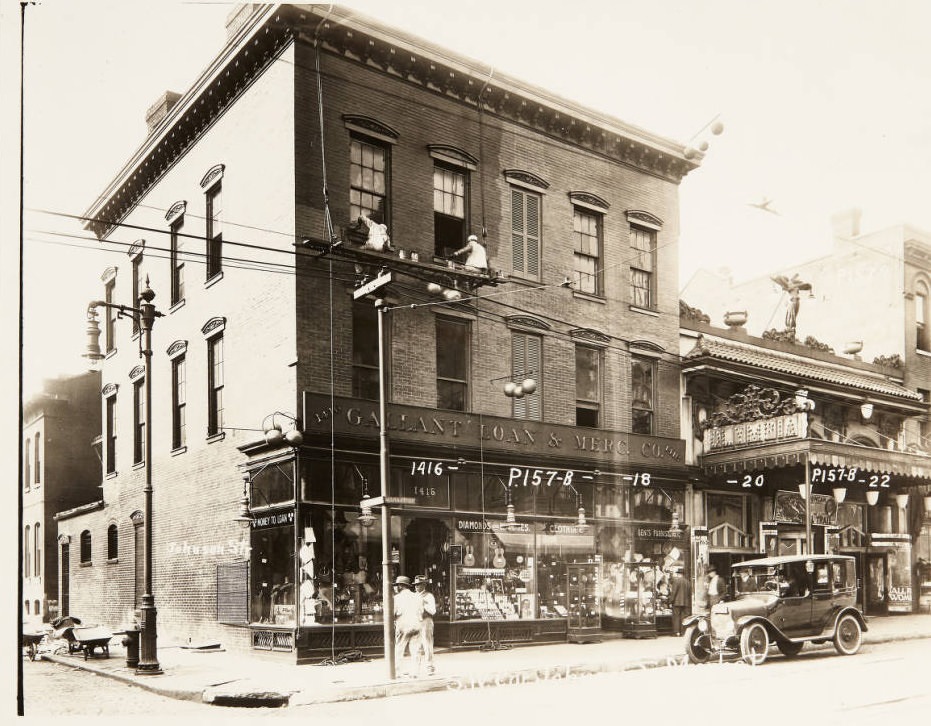 Southwest corner of the intersection of Johnson and Market in 1920, with the Gallant Loan and Mercantile Co. at 1416 Market and the Olympia Theatre next door at 1420 Market.