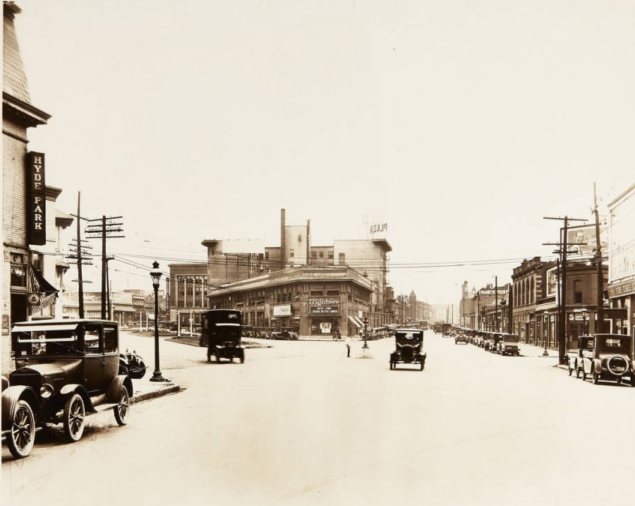 Olive Street looking east in 1920. The Plaza Hotel is denoted by a sign atop 3301 Olive, where Olive used to intersect with Locust Street.