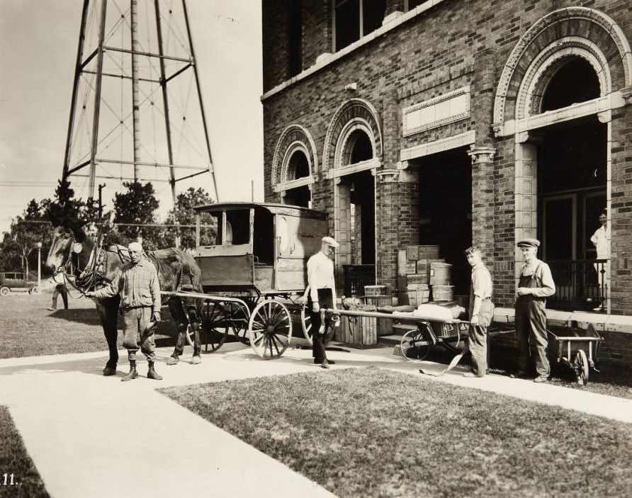 Group of men in front of a medical building in 1920.