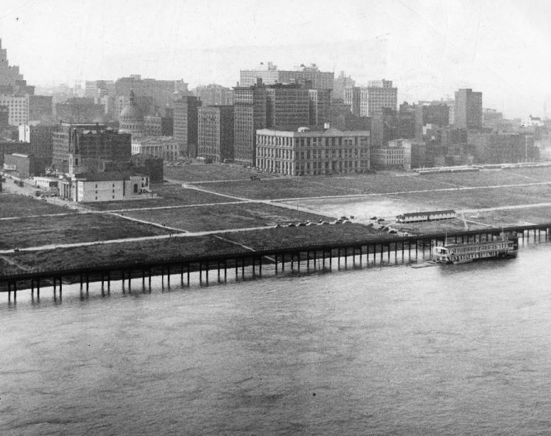 The terminal levee tracks along the riverfront of St. Louis were under several feet yesterday, and the trains were being rerouted over the elevated tracks, 1940