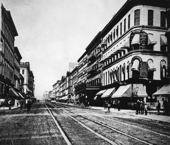 Fourth street looking north from Olive showing Everett House on right with porch, 1949