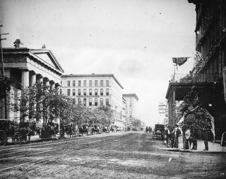 Broadway looking south from Chestnut. Showing court house, Bryant and Stratton Business College and Southern Hotel on left side of plate, 1949