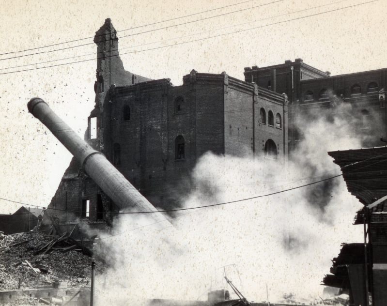 Wainwright Brewery Razing, 1945. Demolition of the Wainwright Brewery building on 10th and Gratiot street. The amount of smoke increases as the majority of the side building and the pillar collapse.
