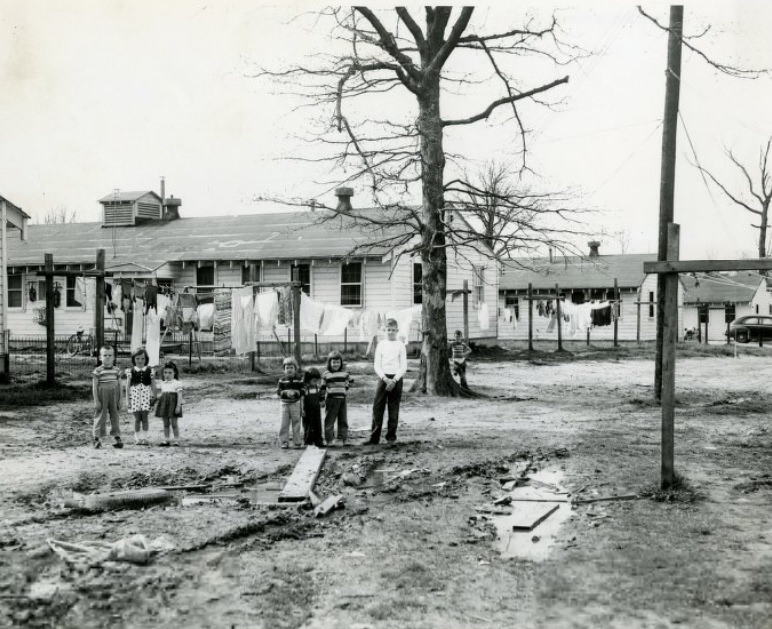 A mud hole, attended by children, in the rear of 1100 block of Scott next to Jefferson Barracks, 1955