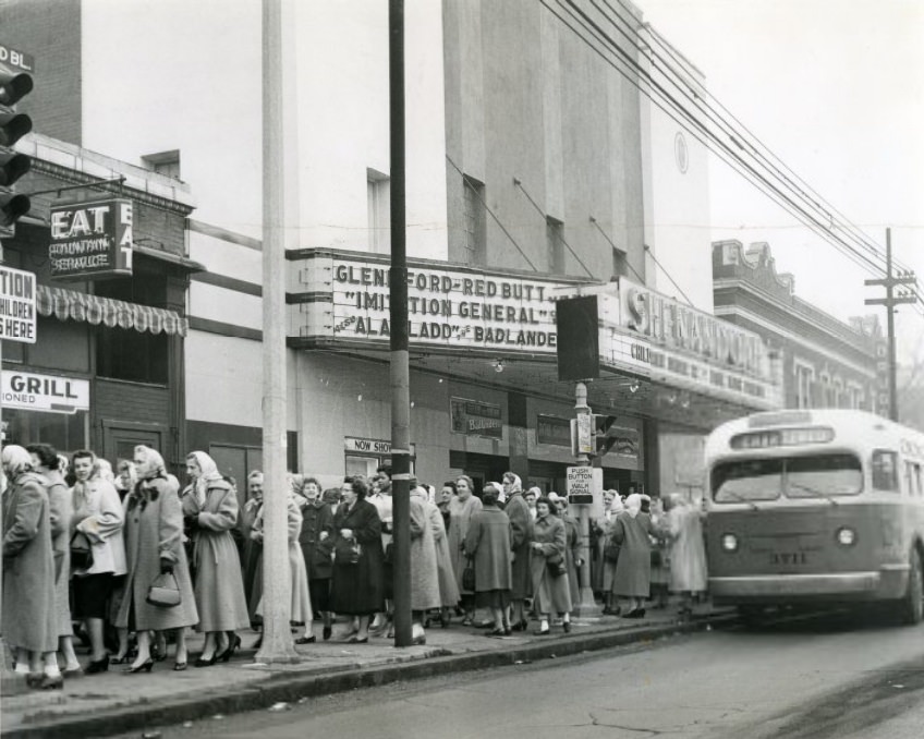 Throngs of women pour into the Shenandoah Theater (above) for two films on cancer presented at 23 St. Louis area theaters by The Globe-Democrat and the American Cancer Society's St. Louis and St. Louis County unit, 1959