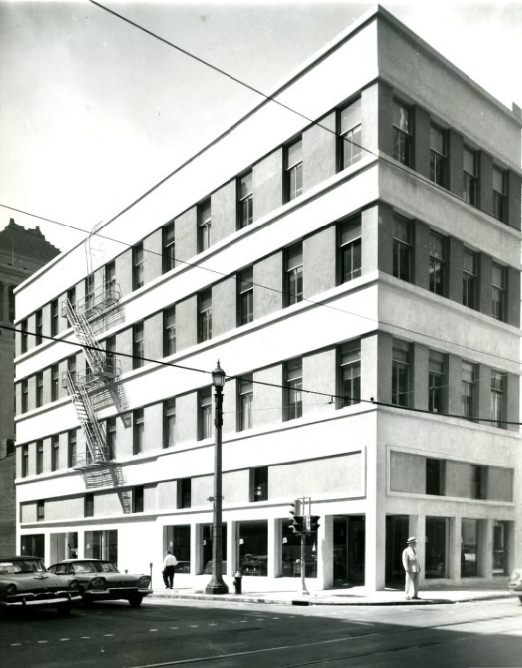 The old Conroy building at Eleventh and Olvie streets, which was built in 1875, has become the new and modern Eleven Hundred Olive building, 1958