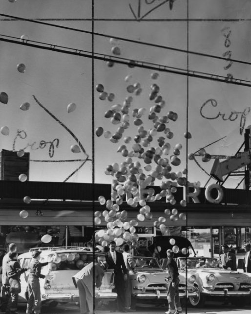 A mass of balloons being released over St. Louis, 1956