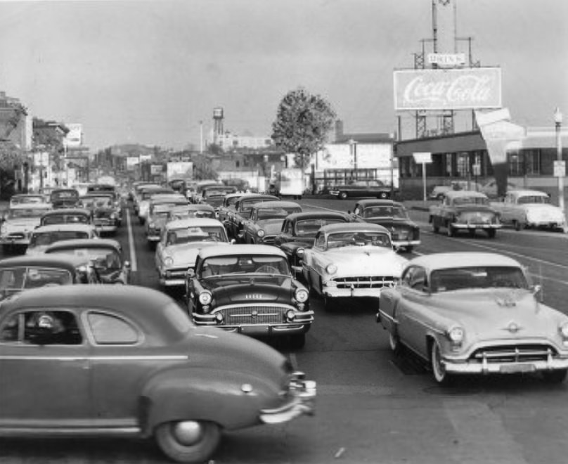 Street Scene, looking east on Market street from Theresa street about 5 p. m., 1955