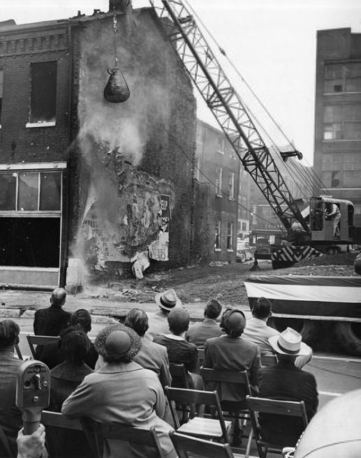 Plaza Apartments - Mayor Tucker swings the wrecking ball, 1955