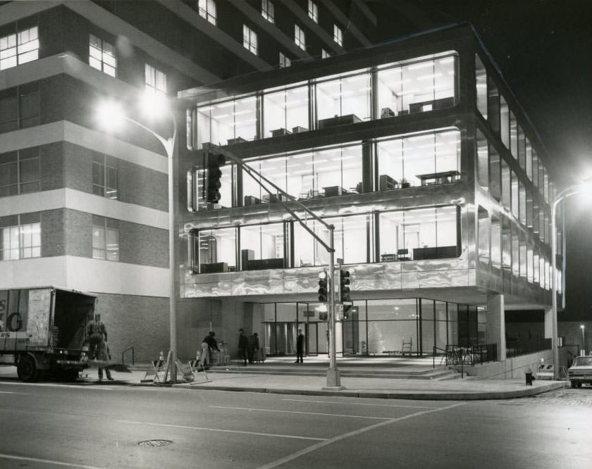 Three moving vans shttled the whole night through one night this week to install Americaan Zinc Company in its shining new American Zinc Building at 20 South Fourth street, 1960
