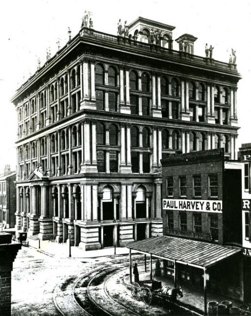 Sixth and Locust, northwest corner. St. Louis first skyscraper made this rather abbreviated appearance in 1878 when Paul Harvey & Co. was selling furnaces, ranges, and stoves at 523 Locust across the street.