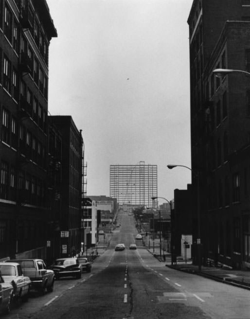 Resembling a huge billboard is steel framework of Heritage House, a 19-story retirement community under construction, 1960