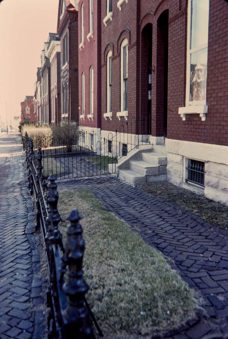 Sidney St., south side entrance to residence, looking east, 1977