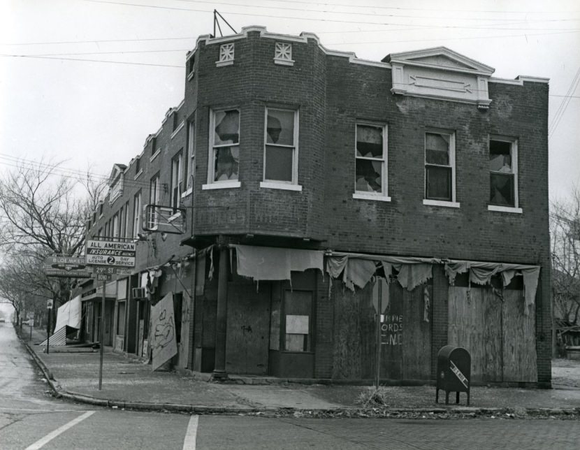 An abandoned and deteriorated building at the corner of 29th St. and Bond Ave, 1972