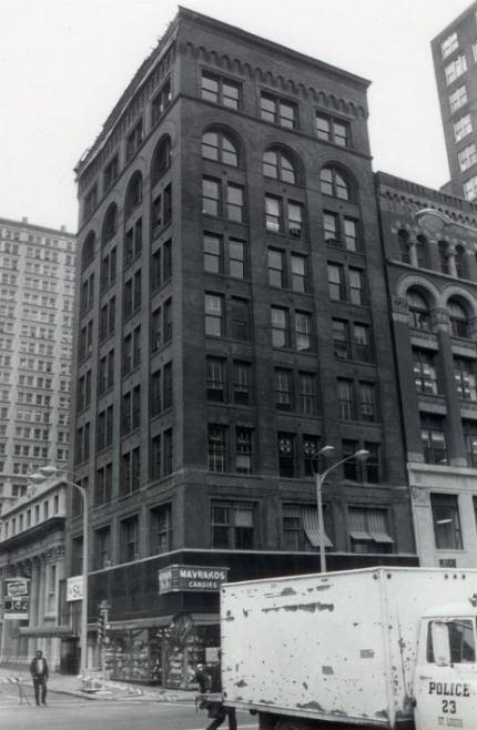 A building with a candy shop located at the bottom, 1973