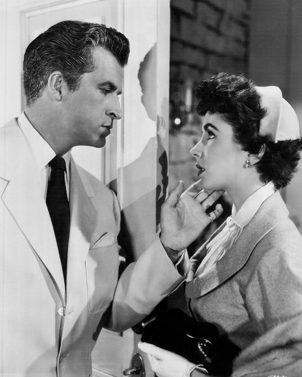 Elizabeth Taylor and Fernando Lamas in "The Girl Who Had Everything" (1953). Also starring William Powell.