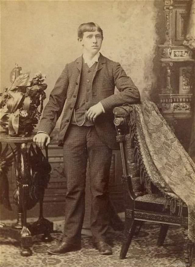 Young Man Gripping Table