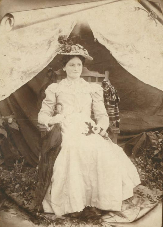 Seated Woman With Umbrella