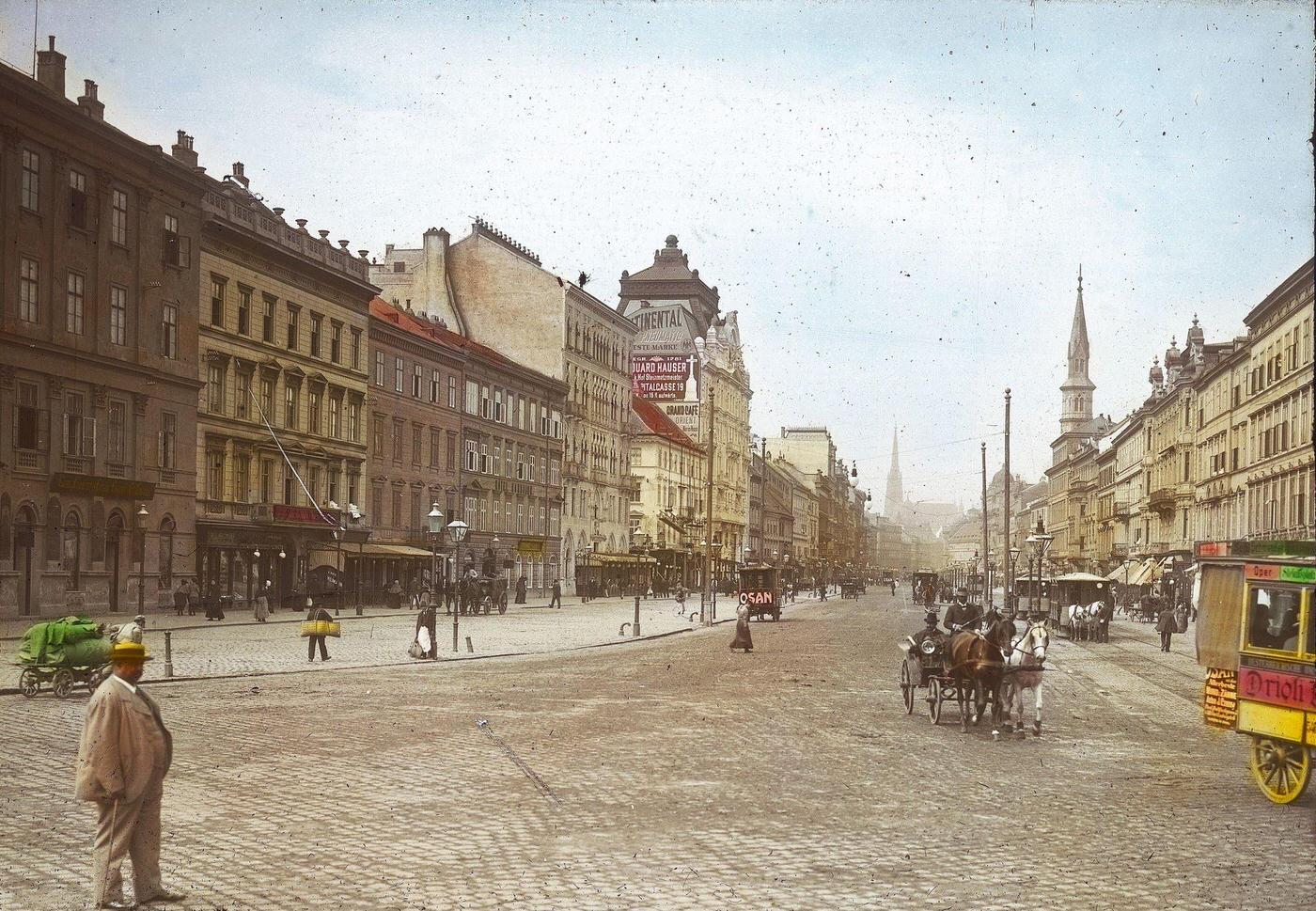 View of the Praterstrasse from the Praterstern square in Vienna's 2nd district with the St. Stephen's Cathedral in the background, 1900.