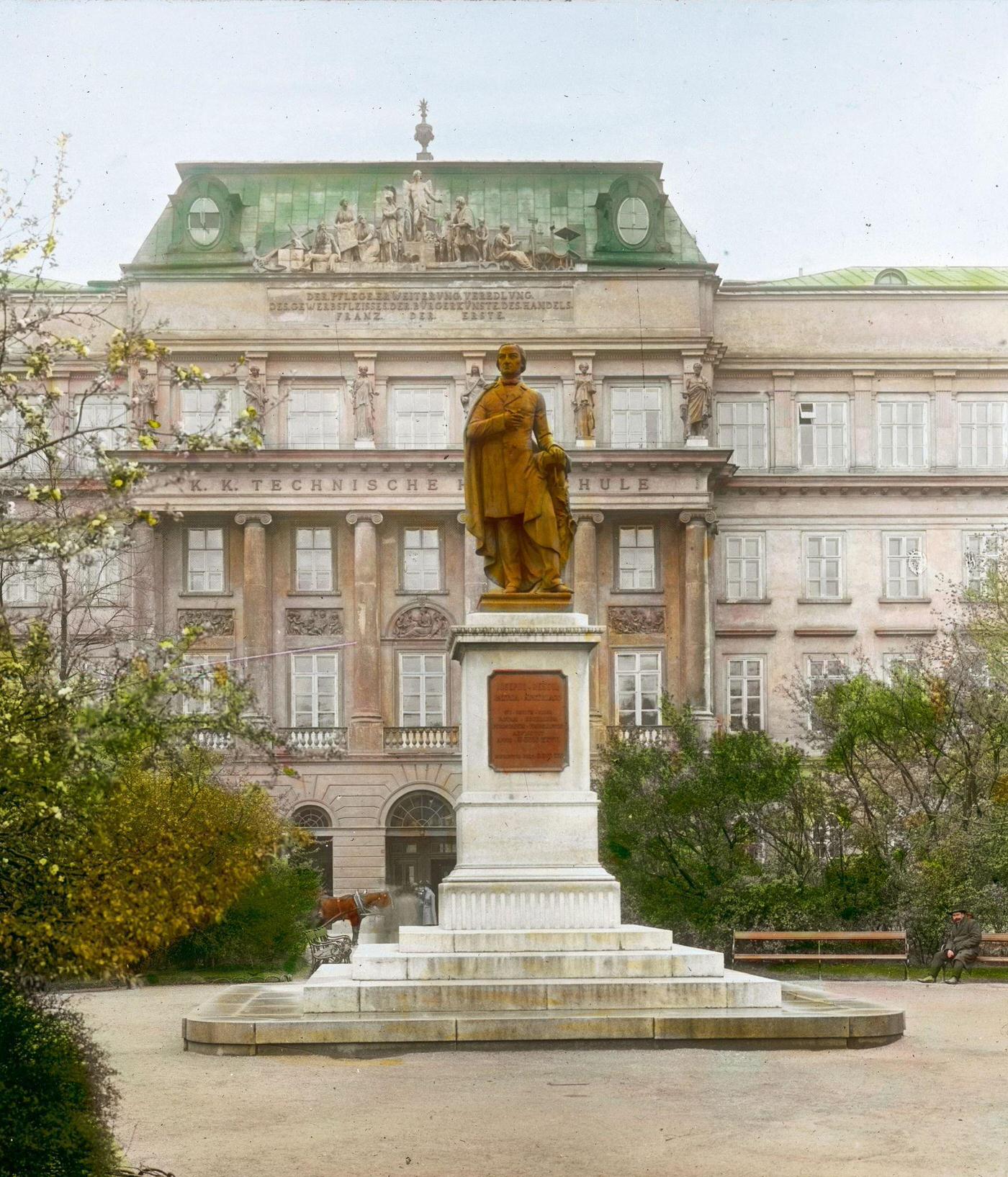 Monument of Josef Ressel in Ressel Park at Karlsplatz, with the technical college of Vienna in the background. Vienna, 4th district, 1900.