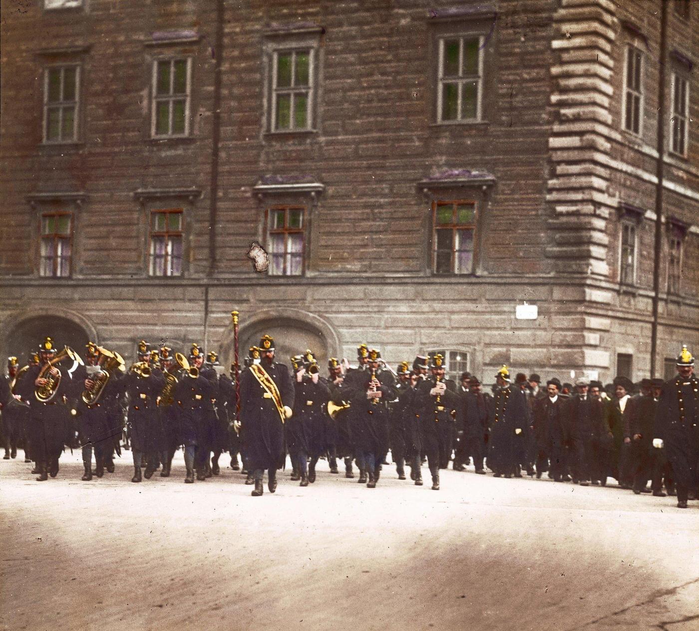 Musicians of the Viennese Hoch- und Deutschmeister, the so-called "Burgmusik," marching to the Inner Burghof in the Hofburg Imperial Palace, 1905.