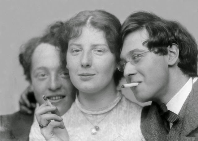 Three friends enjoying cigarettes, 1920.