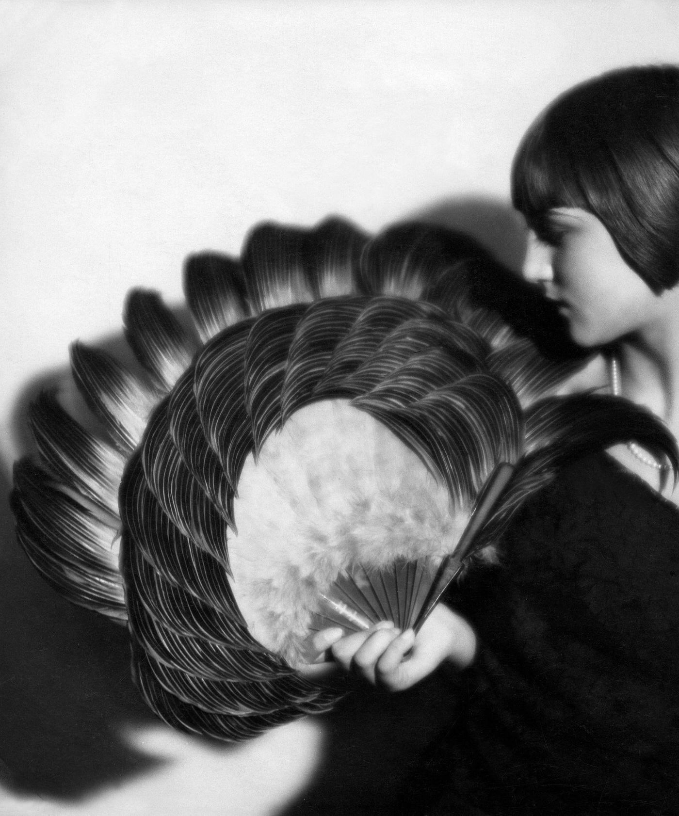 Lady with a Plume Fan, Portrait in Profile, 1927: Elegance and Mystery with a Cigarette