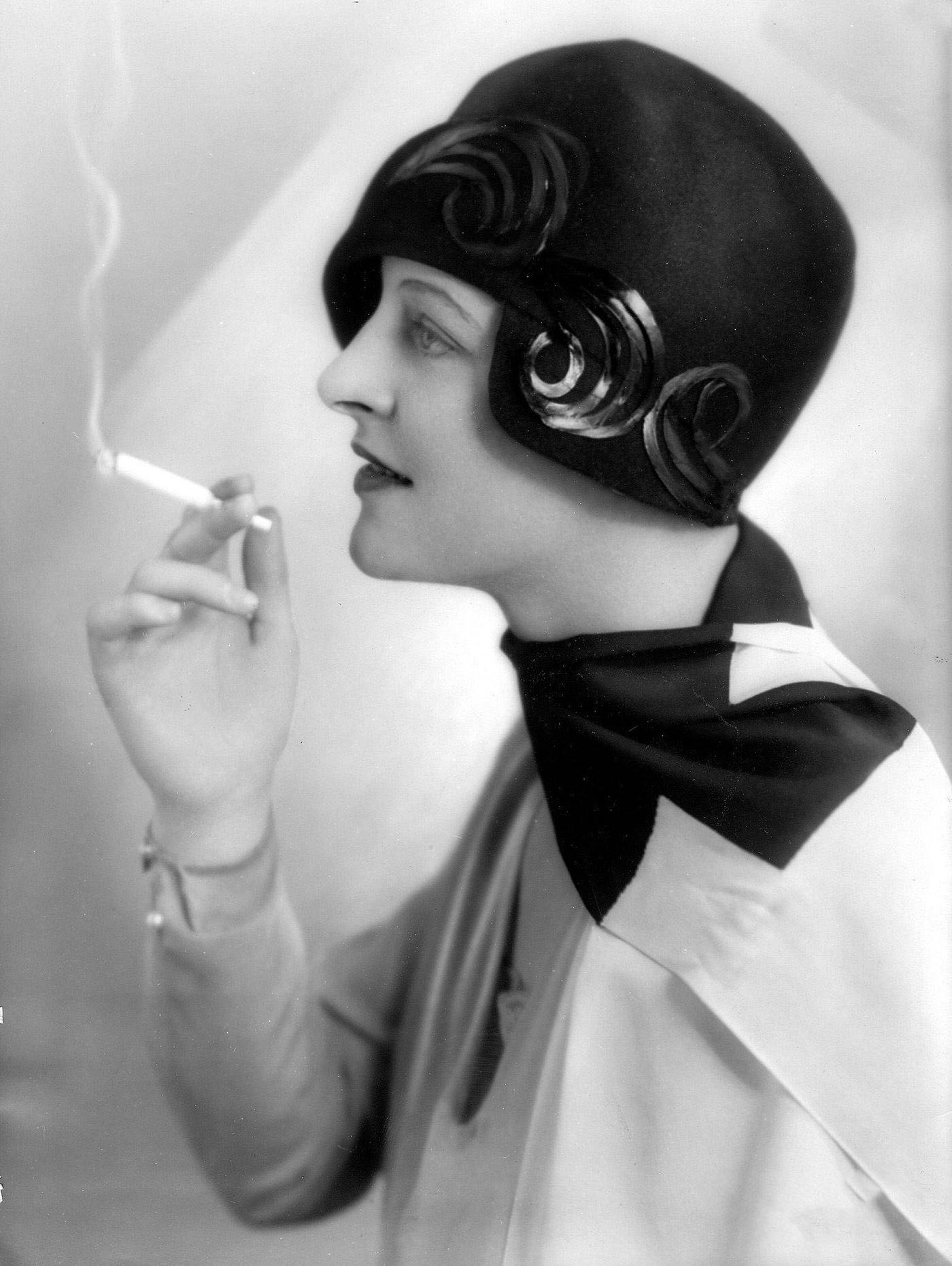 Fashion Pictures: Miss d'Orloff Wearing Applique Hat, 1928: A Stylish Statement with a Cigarette