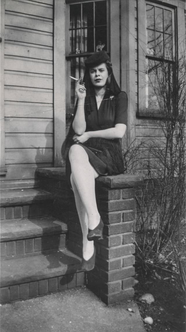 Lighting Up the Past: Vintage Photos of Women Smoking Cigarettes from the 1920s to 1950s