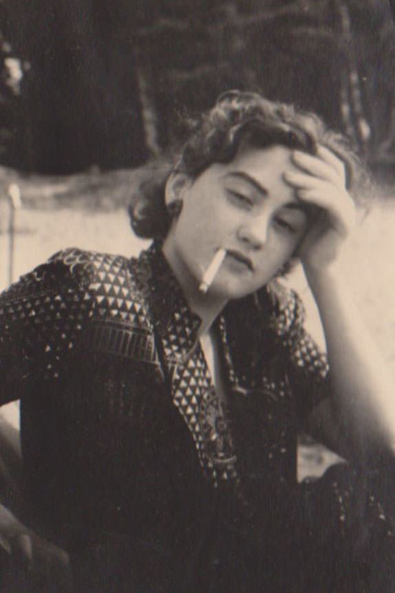 Lighting Up the Past: Vintage Photos of Women Smoking Cigarettes from the 1920s to 1950s
