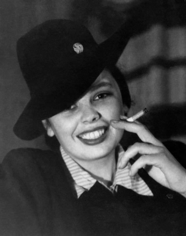 Lighting Up the Past: Vintage Photos of Women Smoking Cigarettes from the 1920s to 1950s