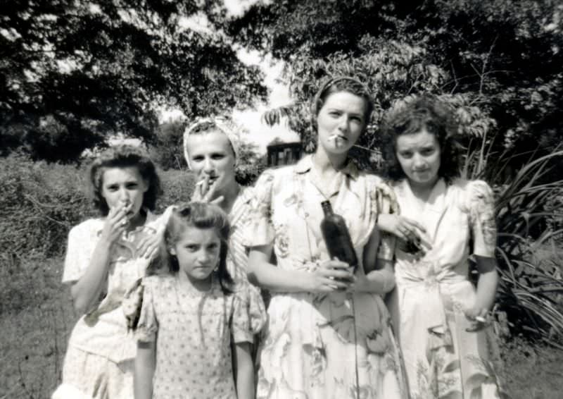 Lighting Up the Past: Vintage Photos of Women Smoking Cigarettes from the 1920s to 1950s