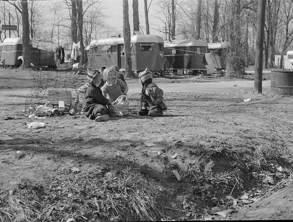 Children of defense workers playing near their "homes" trailers. Trailer camp on Mount Vernon Highway near Alexandria, Virginia, 1941