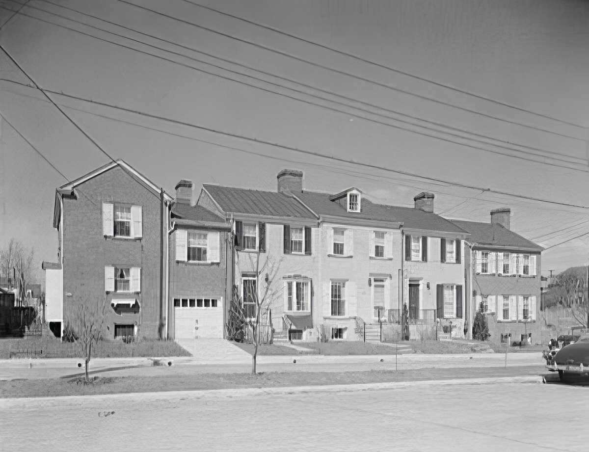 Row houses in Yates Gardens from across street, 1920s