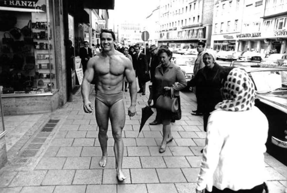 Incredible Photos of Arnold Schwarzenegger Parading Through Munich in Swim Trunks, 1967