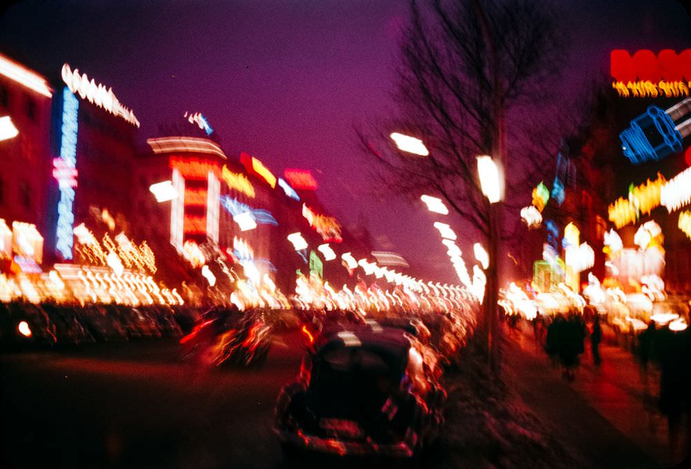 An evocative, possibly intoxicated handheld shot of Berlin's Kurfürstendamm, a busy retail street in West Berlin.