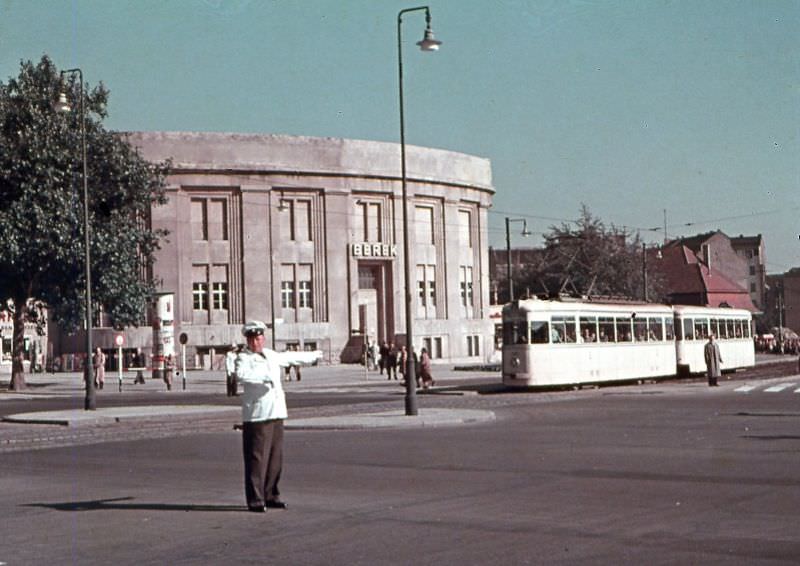 Line 75 tram passes HQ of advertising and publishing firm, Berlin, 1954