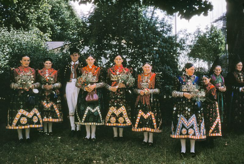 Several Women and a Man in traditional costumes, Spring or Folk Festival, Wurzburg.