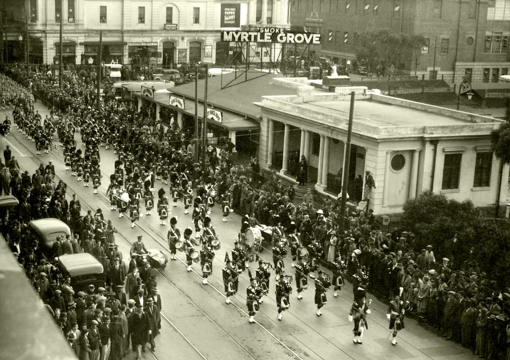 The visiting Gordon Highlanders marching down Darling street, 1936